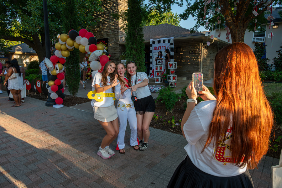Sorority members pose for photo at Bid Day