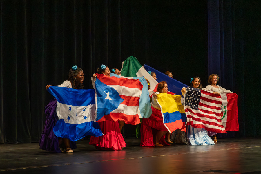 Dancers with Latin American flags at festival