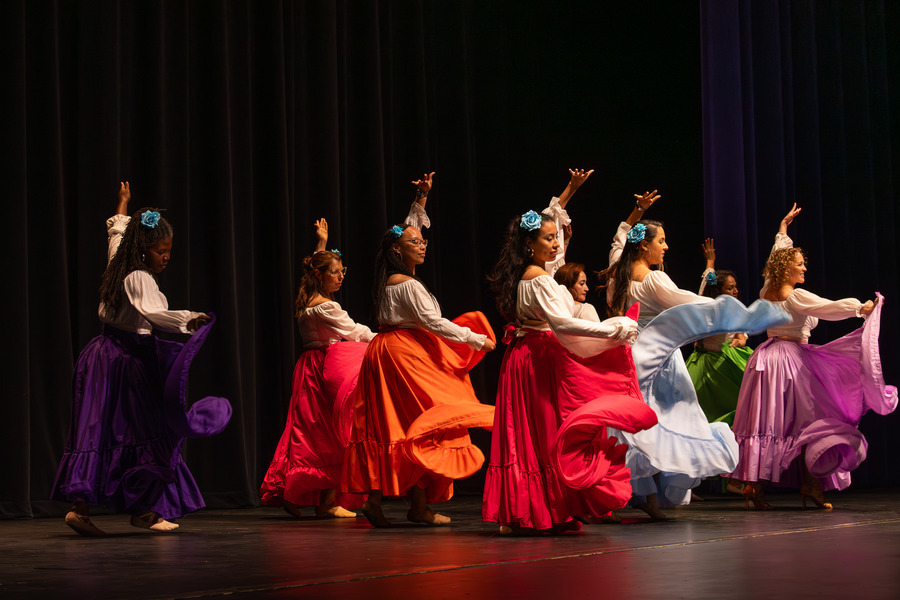 Dancers in colorful skirts at Festival de las Flores