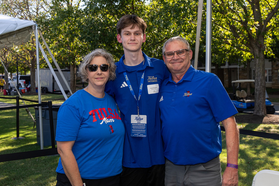A UTulsa student and his parents at Parent & Family Weekend