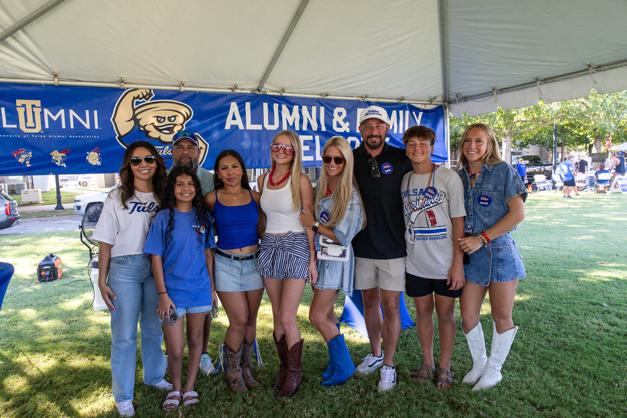A large group attends the Tulsa Alumni tailgate