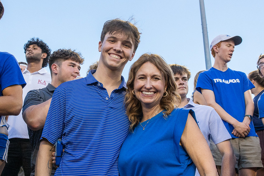 Mother and son at Parent & Family Weekend football game