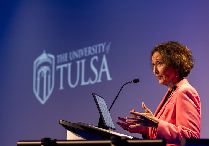 UTulsa President Stacy Leeds speaking at a podium