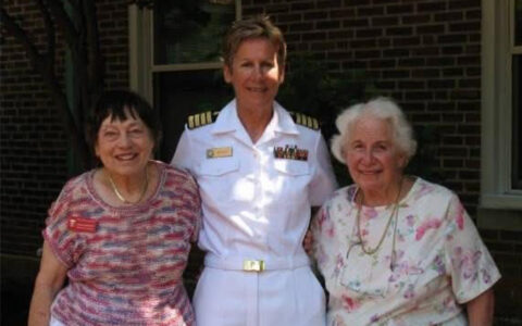 Capt. Beasley with two women