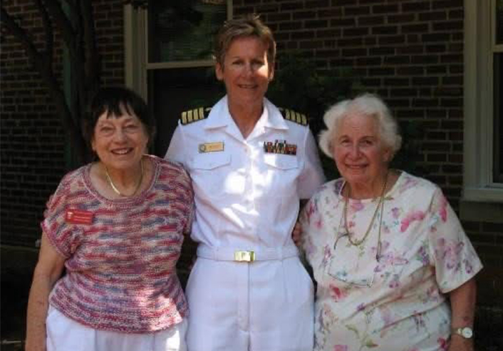 Capt. Beasley with two women